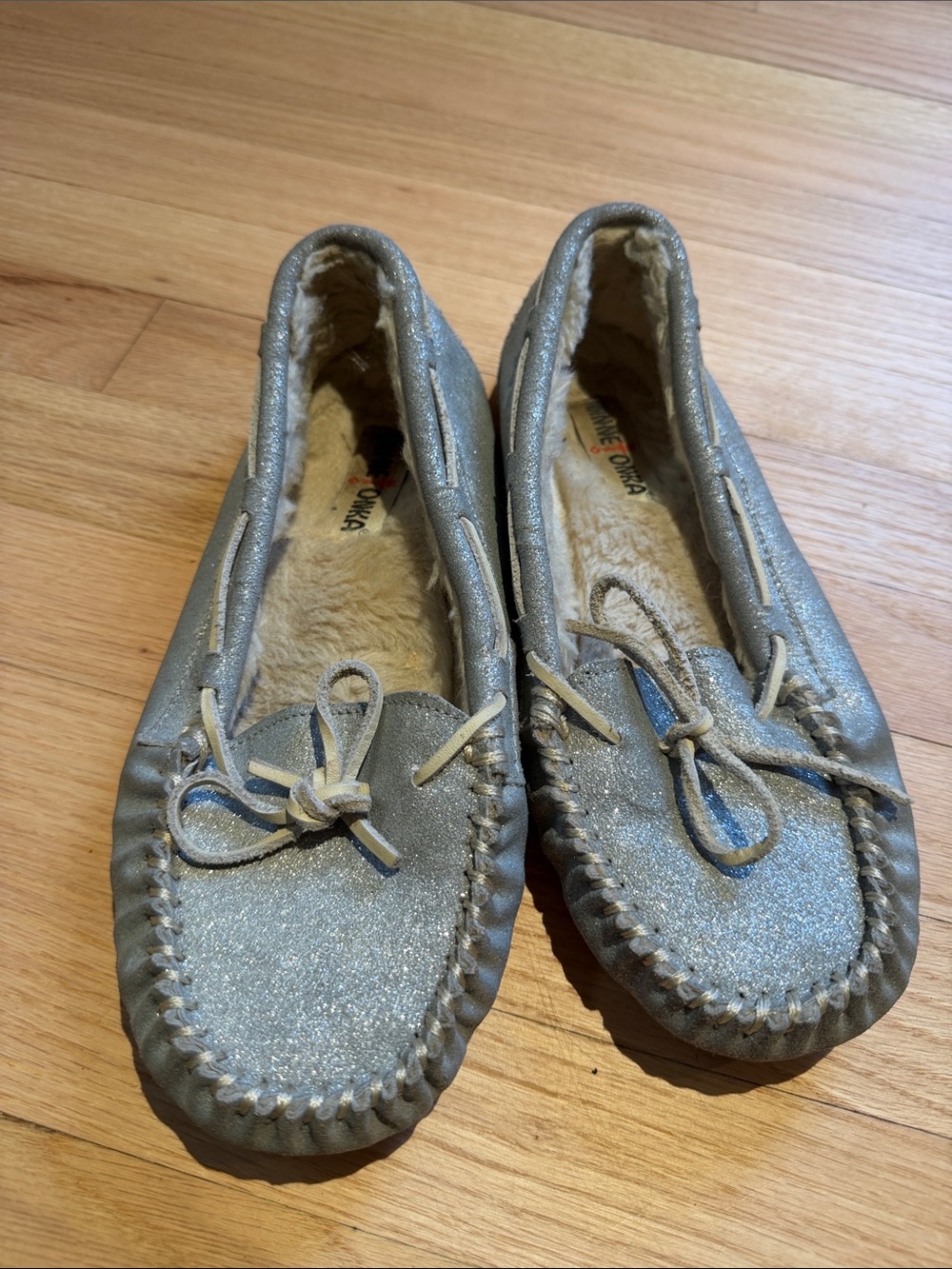 Minnetonka Silver Glitter Moccasin Slippers with Faux Fur Lining